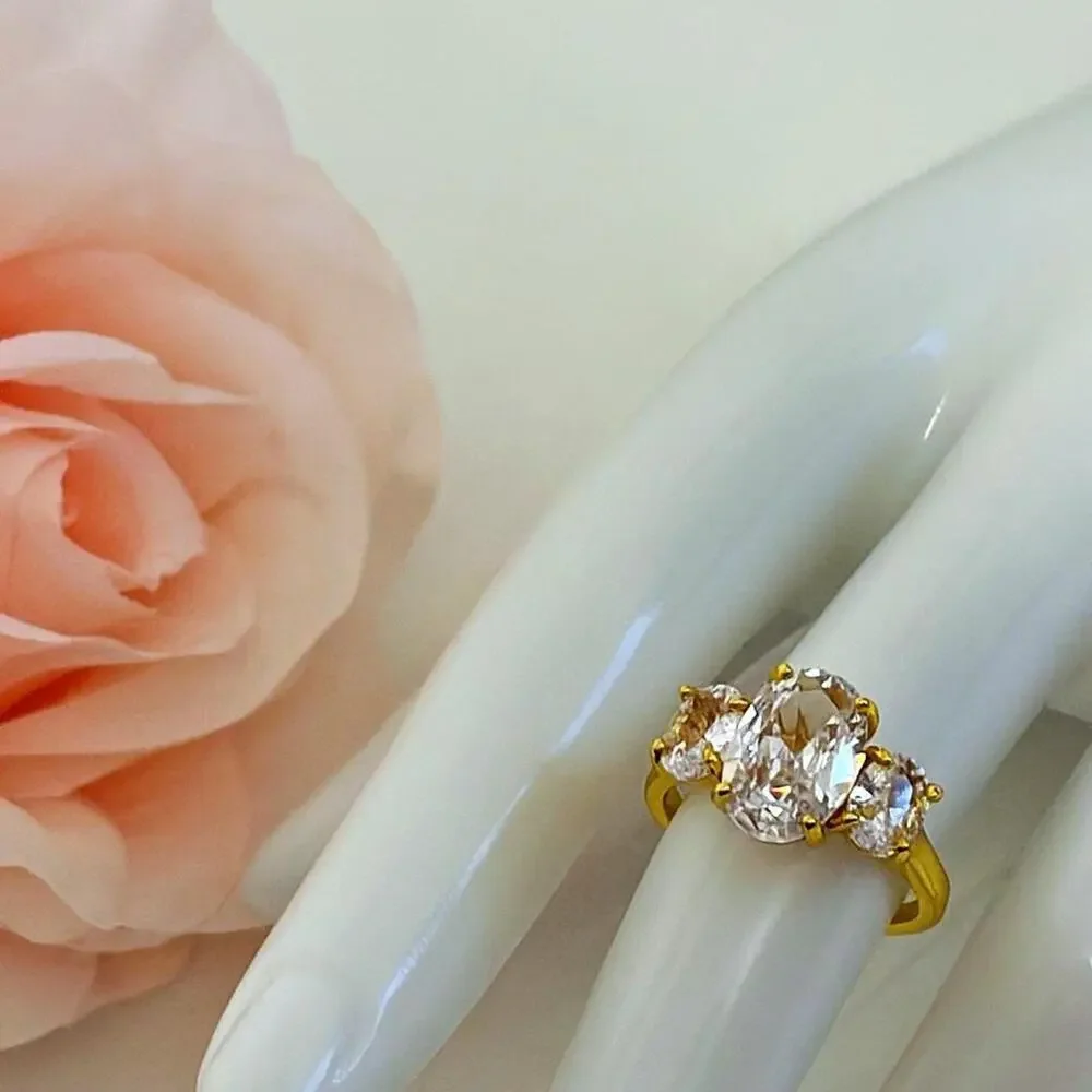 18k gold plated ring with 3 prong CZ diamonds